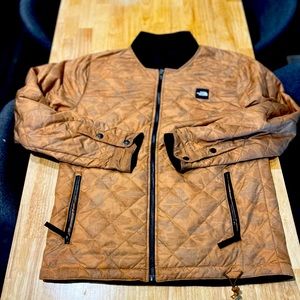 The Northface Men’s rare reversible button up Camo/black jacket.Men’s size M
